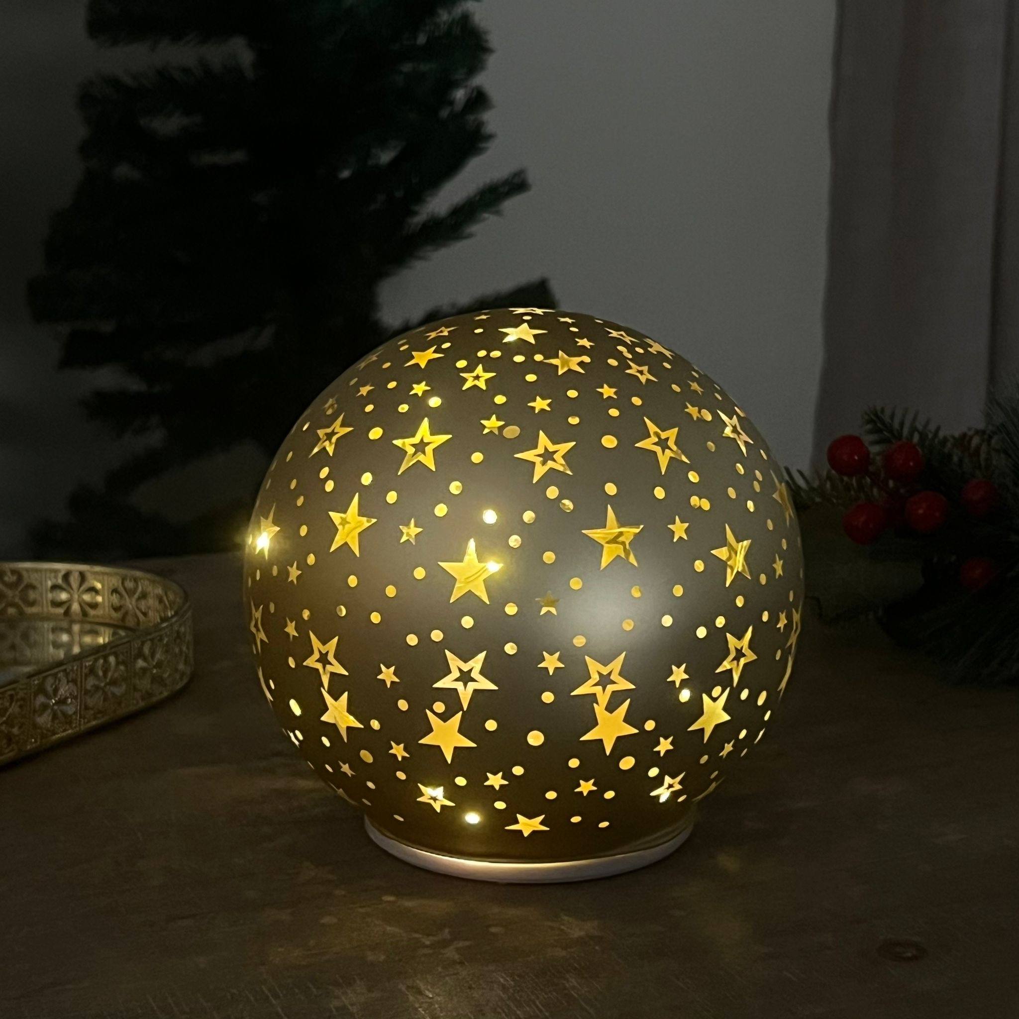 Palla in vetro girevole luminosa oro stelline