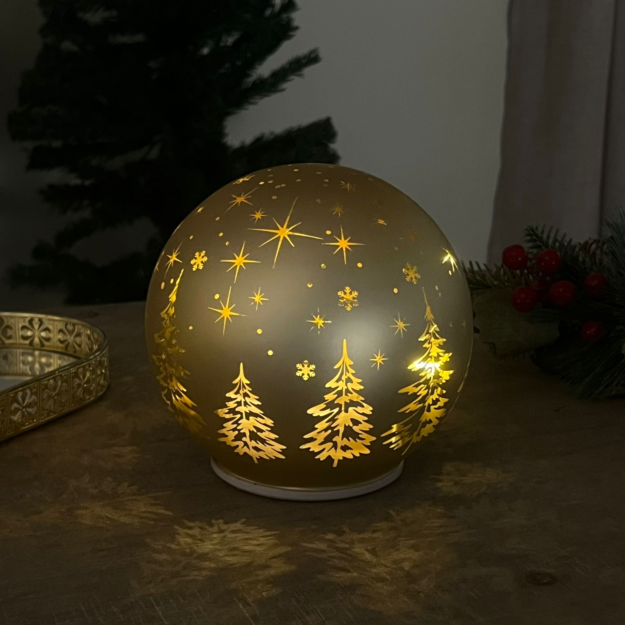 Palla in vetro girevole luminosa oro alberelli
