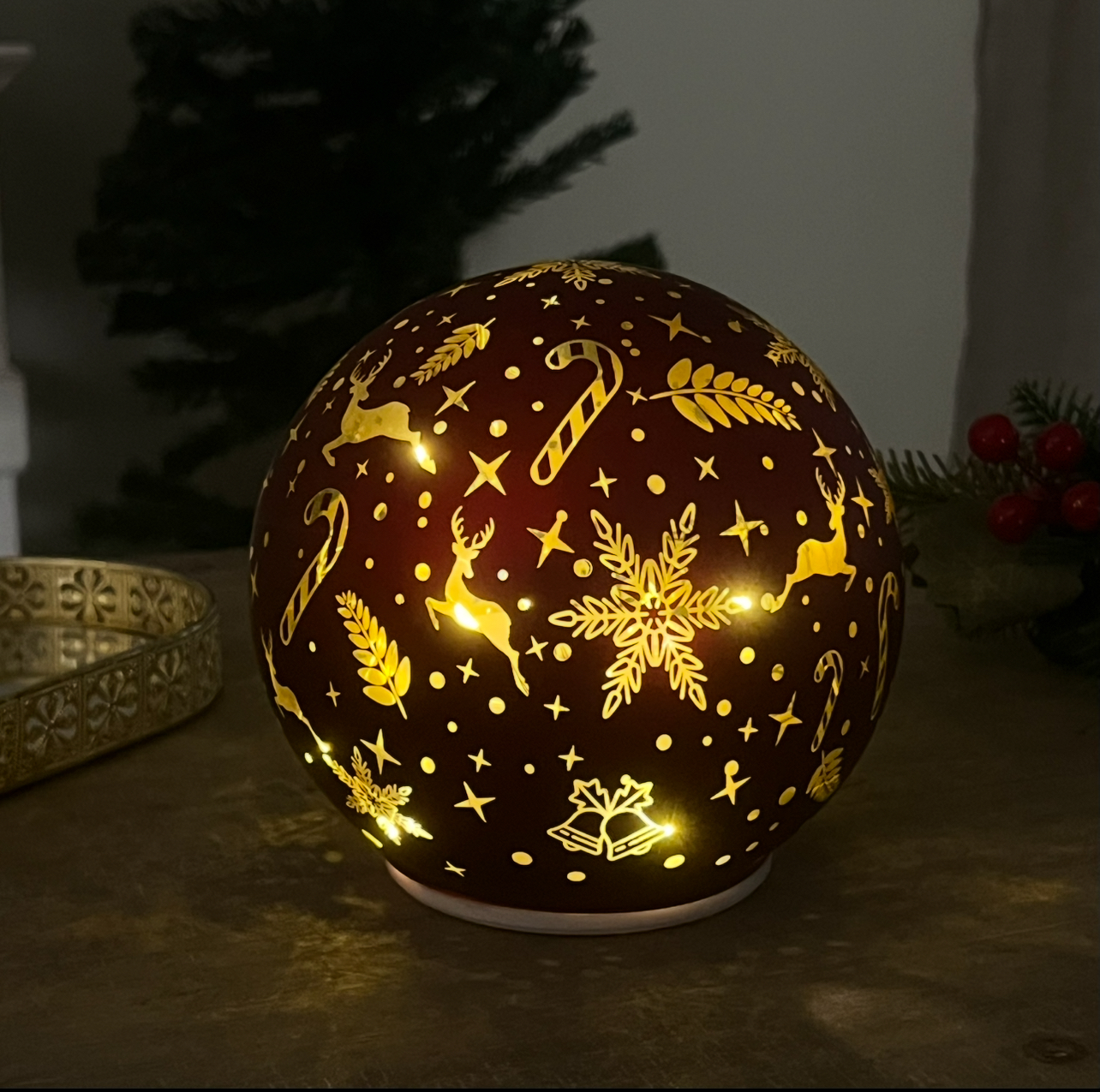 Palla in vetro girevole luminosa rossa soggetti